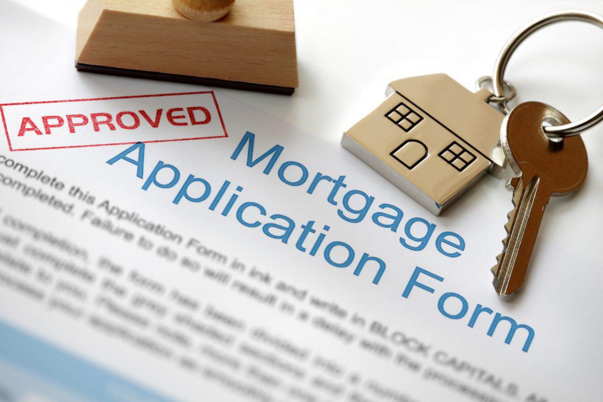Mortgage application form and house keys